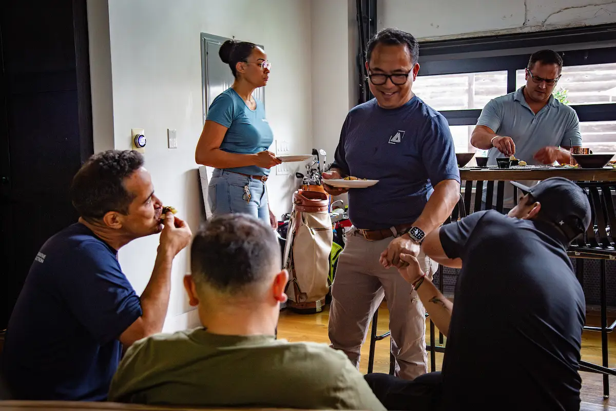 Avant team members gathered around a table